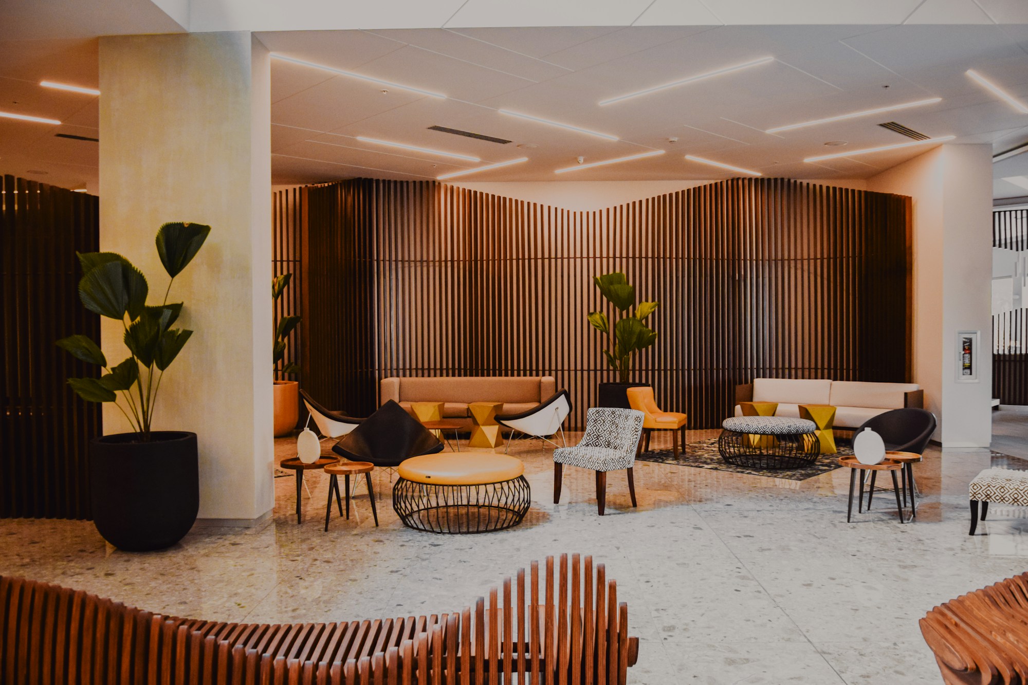 A boutique hotel lobby with designer furniture